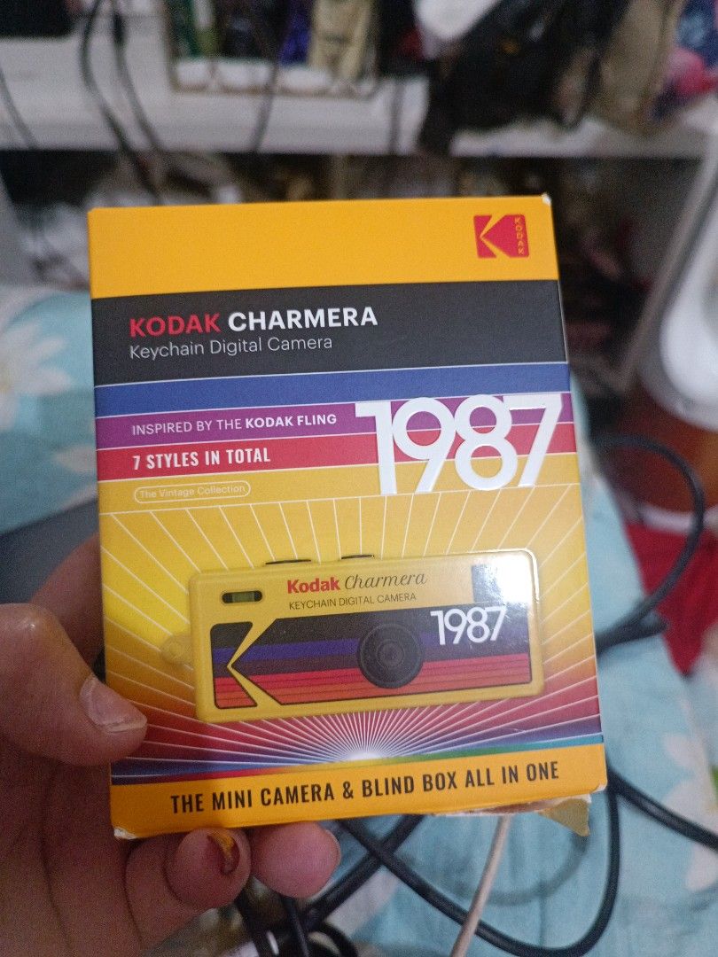 Kodak Charmera Keychain Digital Camera 1987 Edition (Category: Cameras) located in Rizal. Submitted by elsie1206 (Listing ID 1440975431, Image 1). Description: - Authentic 1987 Kodak Charmera keychain digital camera - Inspired by the classic Kodak Fling design - Comes in a collectible blind box with 7 different styles to discover - Perfect for collectors or as a unique retro gadget.