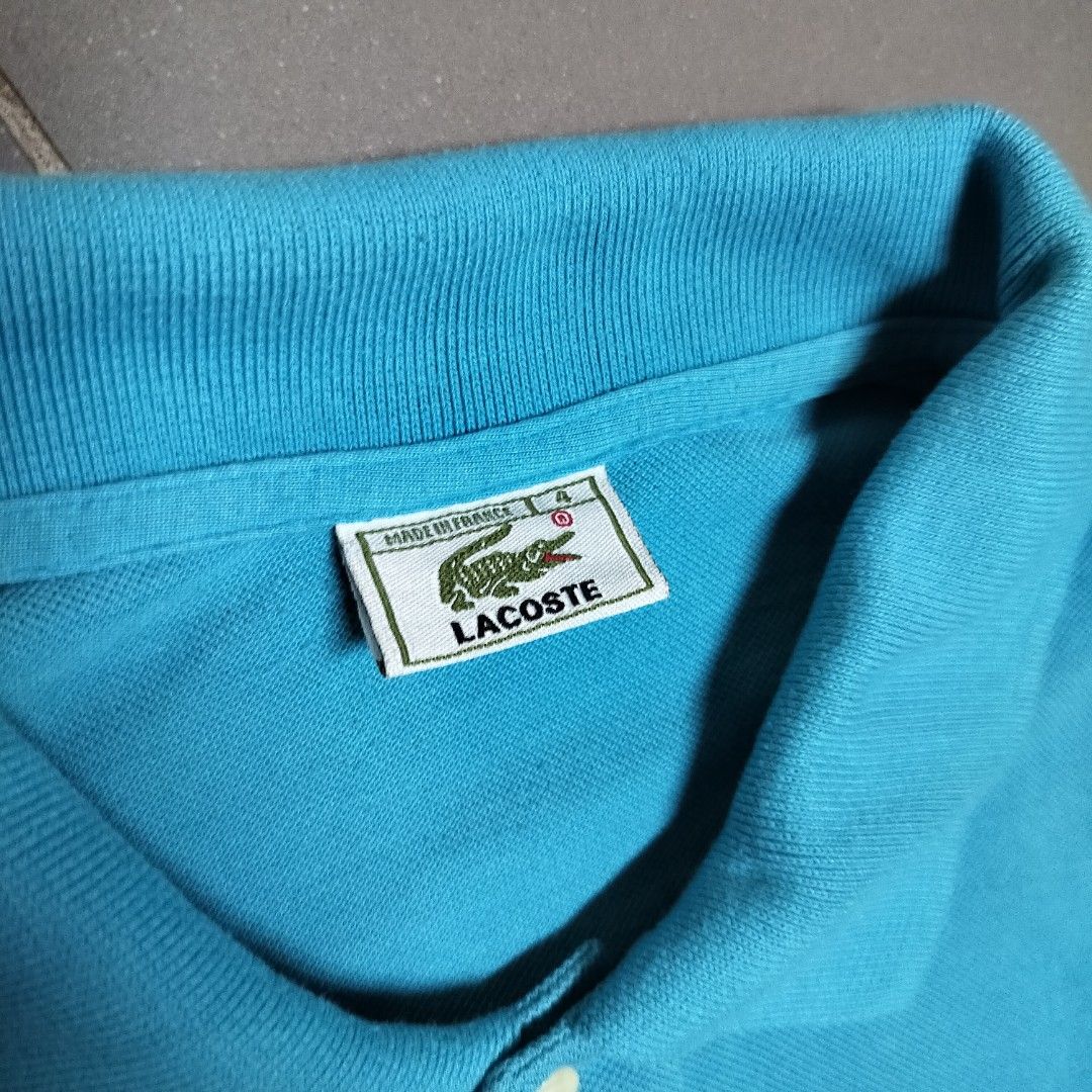 Lacoste Polo Shirt Blue Size 4 (Category: Tshirts & Polo Shirts ) located in Manila. Submitted by markjunks00 (Listing ID 1440962149, Image 3). Description: - Classic blue Lacoste polo shirt - Iconic crocodile logo - Made in France - 100% cotton material - Comfortable and breathable - Great for casual wear.