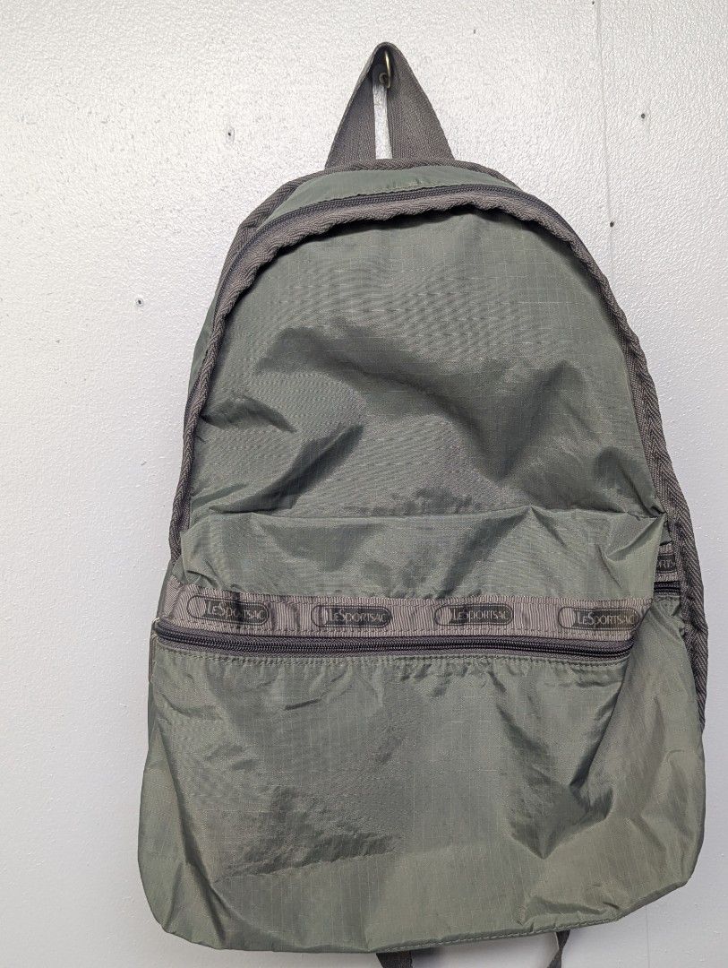 LeSporSac Basic Backpack (Category: Backpacks) located in Quezon City. Submitted by taga.lupa (Listing ID 1440979524, Image 1). Description: Location:Cubao QC Price:700 For Sale: LeSportSac Basic backpack in olive (Back-to-school sale) -Olive Color with LeSportSac branding in front pocket and zippers -Water resistant, with water proof bag coat -Great for school -Issue, Slight discoloration on front due to storage issue, hindi halata. Price: 700 (