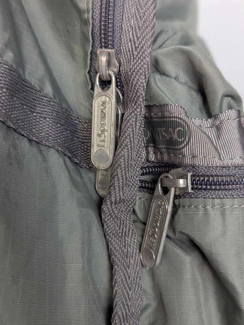 LeSporSac Basic Backpack (Category: Backpacks) located in Quezon City. Submitted by taga.lupa (Listing ID 1440979524, Image 2). Description: Location:Cubao QC Price:700 For Sale: LeSportSac Basic backpack in olive (Back-to-school sale) -Olive Color with LeSportSac branding in front pocket and zippers -Water resistant, with water proof bag coat -Great for school -Issue, Slight discoloration on front due to storage issue, hindi halata. Price: 700 (