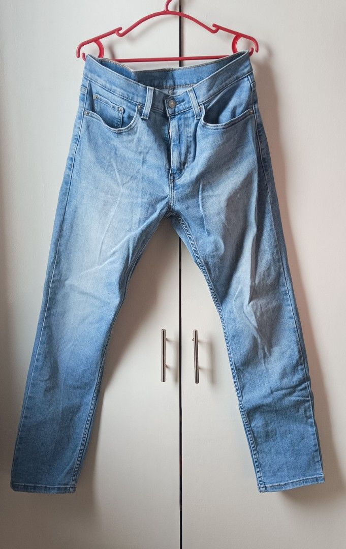 Levi's 502 Light Wash Denim Jeans (Category: Jeans) located in Manila. Submitted by shop_no.15 (Listing ID 1441033077, Image 1). Description: - Classic Levi's 502 jeans - Light blue wash - Straight leg fit -Size 29 on tag, can fit up to Size 32 - Zip fly closure - Iconic blank red tab and leather patch - Altered lenght already, 37 inches - Versatile staple for any wardrobe.