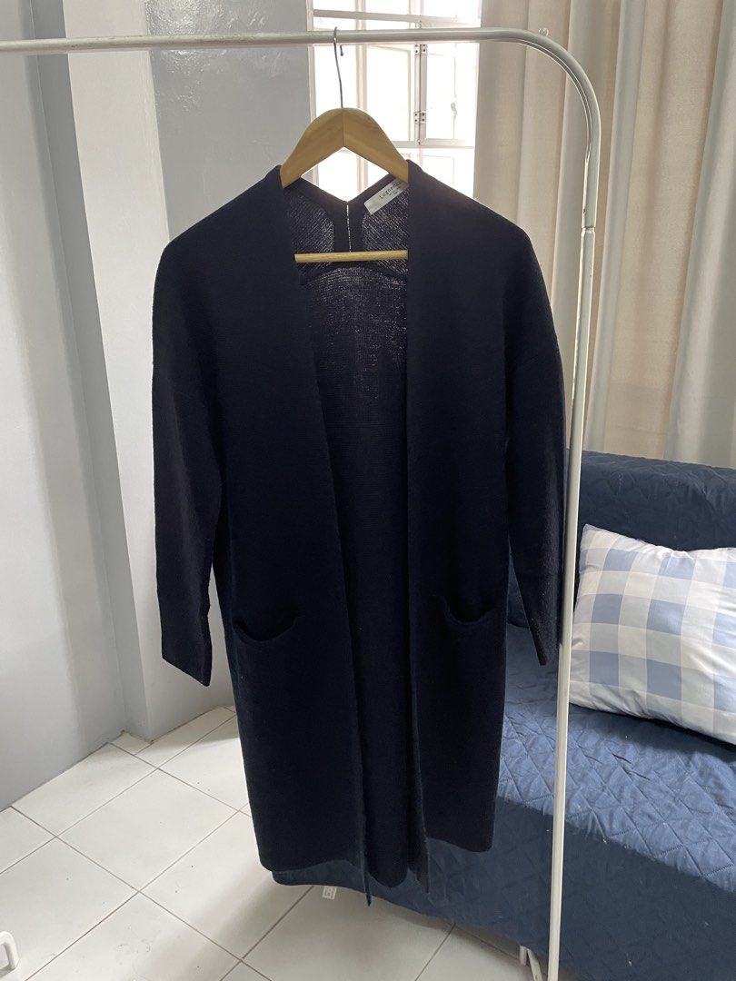 Lignite Navy Blue Longline Cardigan (Category: Coats, Jackets and Outerwear) located in Baguio. Submitted by the_general_store (Listing ID 1440956938, Image 3). Description: - Navy blue longline cardigan - Open front style - Two front pockets - Made from comfortable knit material - Versatile for layering with any outfit - Ideal for cooler weather.