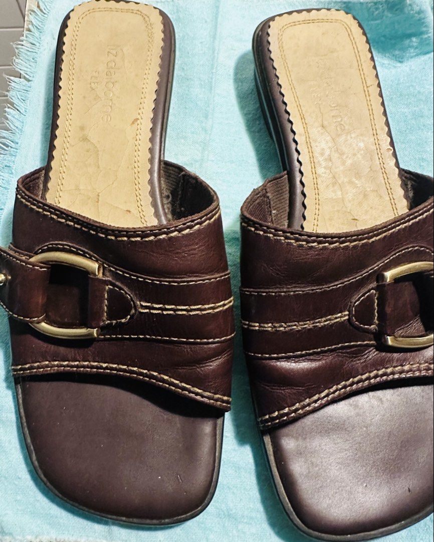 Liz Claiborne Flex Brown Leather Slide Sandals (Category: Flats & Sandals) located in Muntinlupa City. Submitted by nptorres (Listing ID 1441030461, Image 1). Description: - Brand: Liz Claiborne - Style: Brown leather slide sandals - Features: Buckle detail, elastic gore for comfort - Sole: Flex zone for flexibility - Heel: Slight lift - Perfect for: Casual wear.