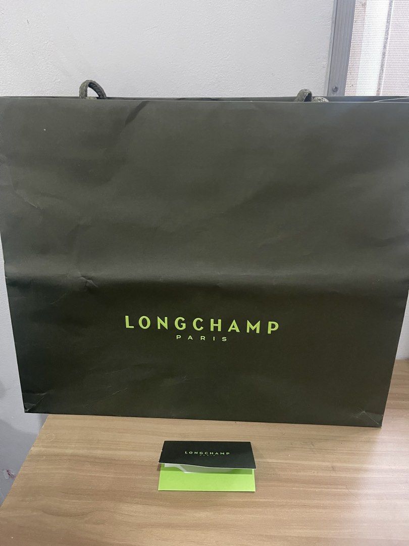 Original Longchamp Le Pliage Energy L Backpack (Category: Luxury Bags & Wallets) located in Manila. Submitted by sellerfes (Listing ID 1441020989, Image 3). Description: Brand new. Never been used in commute. If you know your bag, you know this is for you. No receipt. Comes with the original card and package. Reason for selling: need funds - Authentic Black Longchamp backpack - Made from durable nylon with elegant leather details - Convenient zip
