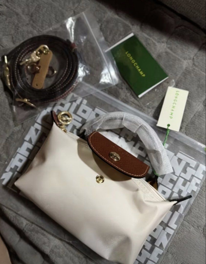 Longchamp Le Pliage Mini Bag (Category: Luxury Bags & Wallets) located in Las Pinas. Submitted by maureendeclutterings2 (Listing ID 1441096407, Image 1). Description: Brand New — archiveallureph 🇯🇵 - Includes branded ziplock - ₱1,000 Down Payment - Arrival 5-7 days after order. AVAILABLE COLORS - Black - Paper White (posted) - Navy Blue - Avocado Green - Ebony Brown - Cherry Blossom Pink.