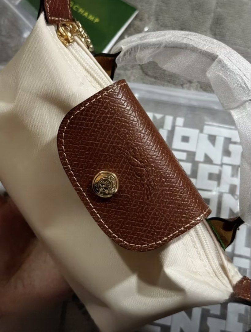 Longchamp Le Pliage Mini Bag (Category: Luxury Bags & Wallets) located in Las Pinas. Submitted by maureendeclutterings2 (Listing ID 1441096407, Image 3). Description: Brand New — archiveallureph 🇯🇵 - Includes branded ziplock - ₱1,000 Down Payment - Arrival 5-7 days after order. AVAILABLE COLORS - Black - Paper White (posted) - Navy Blue - Avocado Green - Ebony Brown - Cherry Blossom Pink.