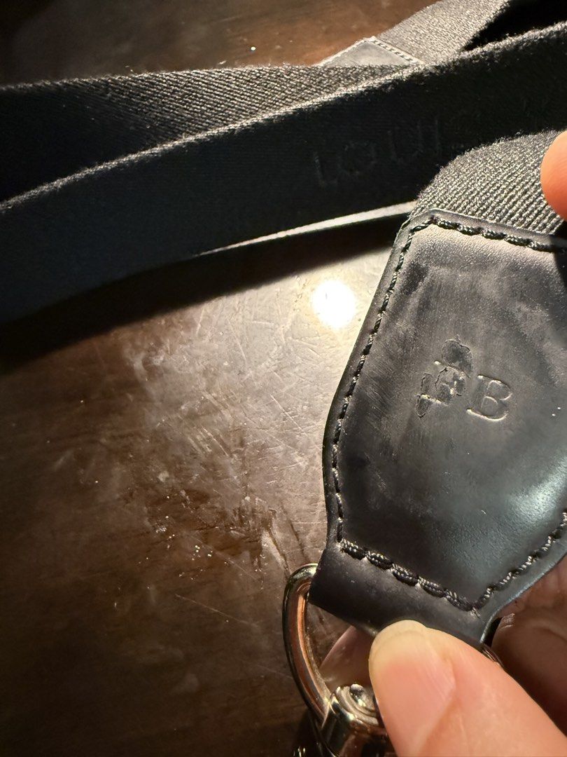 Louis Vuitton Black Monogram Canvas Strap (Category: Luxury Bags & Wallets) located in Mandaluyong City. Submitted by huntervip (Listing ID 1440955074, Image 2). Description: - Authentic Louis Vuitton strap - Black canvas with Louis Vuitton letters - Leather trim with embossed initials FB ( Dad) - Adjustable length with metal hardware - Clasp features LV logo - Ideal for personalizing your handbag.