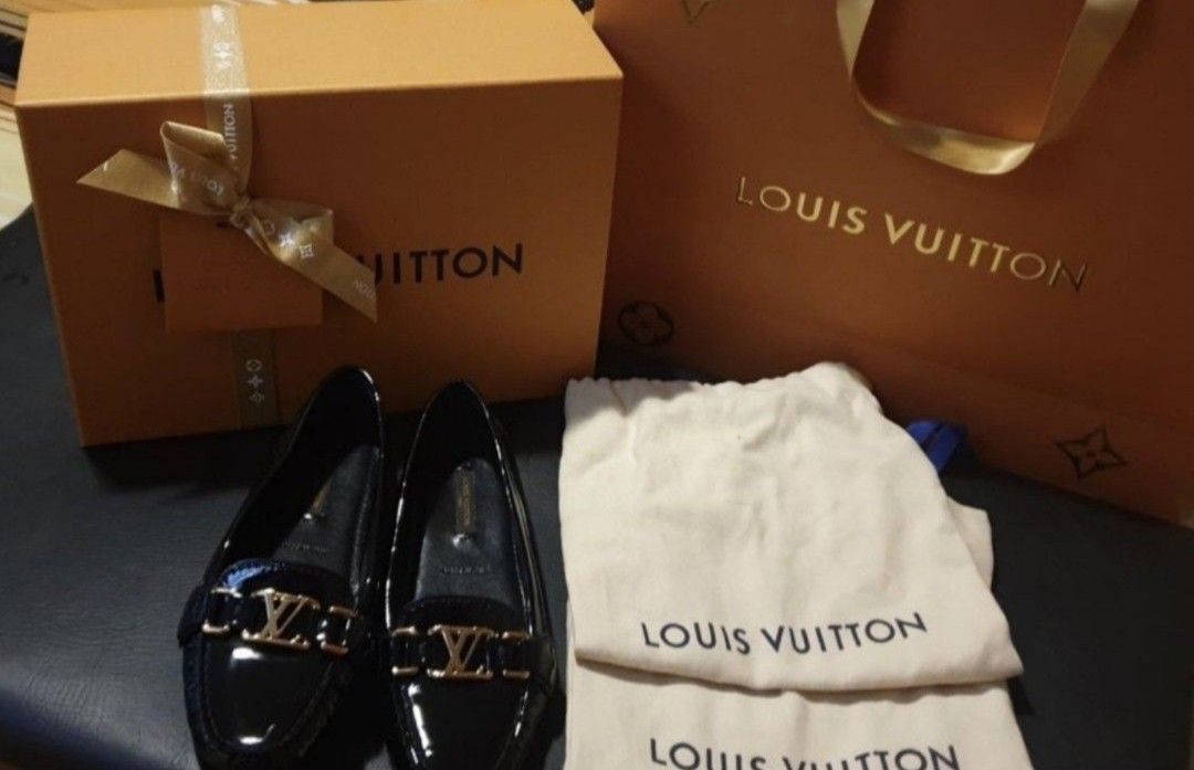 Authentic Louis Vuitton Black with Gold LV Buckle (Category: Sneakers & Footwear) located in Quezon City. Submitted by satisfied100 (Listing ID 1441130579, Image 1). Description: - Authentic Louis Vuitton black -Seize 5.5 - Features iconic gold LV logo buckle - Perfect for both casual and formal wear - Complete with box, dustbag and paperbag -Price PHP 19,999.