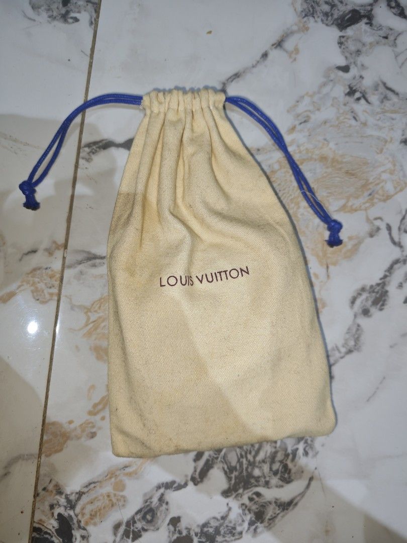 Louis Vuitton Damier Ebene Canvas Wallet (Category: Luxury Bags & Wallets) located in Zamboanga. Submitted by gothicstyle_etc (Listing ID 1441070049, Image 1). Description: - Authentic Louis Vuitton Wallet - Damier Ebene Canvas with Brown Leather Trim - Snap Button Closure - Gold-Tone Hardware with LV Logo - Interior Card Slots and Coin Pocket - Includes Original Dust Bag - Date Code: CA0051.