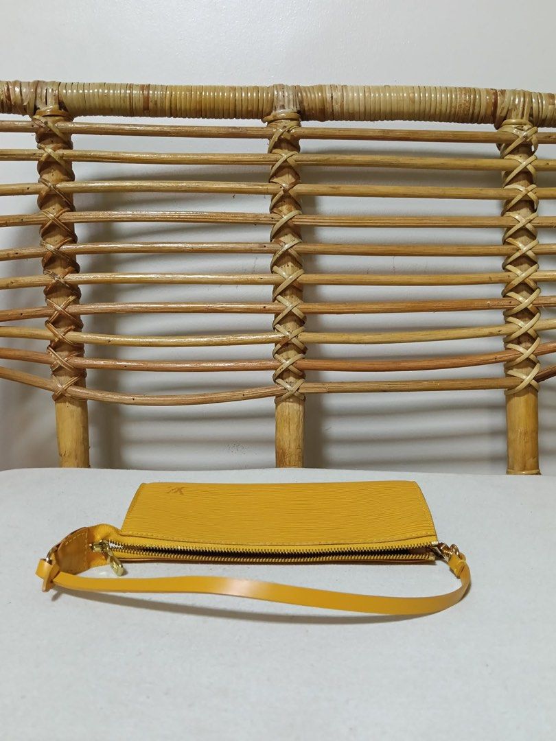 Louis Vuitton Epi Pochette Yellow (Category: Luxury Bags & Wallets) located in Muntinlupa City. Submitted by bff_findsph (Listing ID 1422791106, Image 3). Description: - Authentic Louis Vuitton Epi Pochette - Vibrant yellow color - Epi leather - Zip closure - Single shoulder strap - Purple fabric lining - LV logo embossed - PRESTINE condition.
