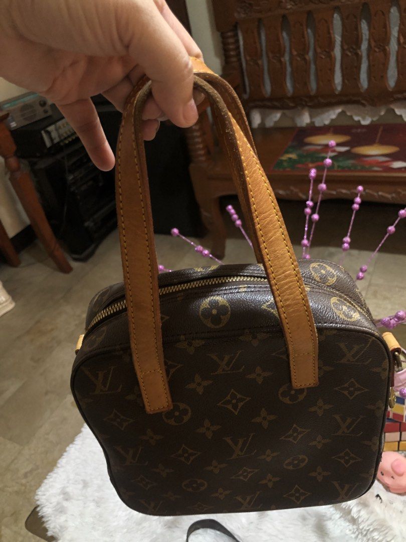 Louis Vuitton Monogram Canvas Spontini Bag with Strap (Category: Luxury Bags & Wallets) located in Meycauayan. Submitted by miletteaqu82717 (Listing ID 1440951893, Image 2). Description: - Classic Louis Vuitton bag - Monogram canvas - Detachable shoulder strap included - Leather handles show some signs of wear - Zipper works smoothly - Timeless and versatile for daily use or travel - not coded.
