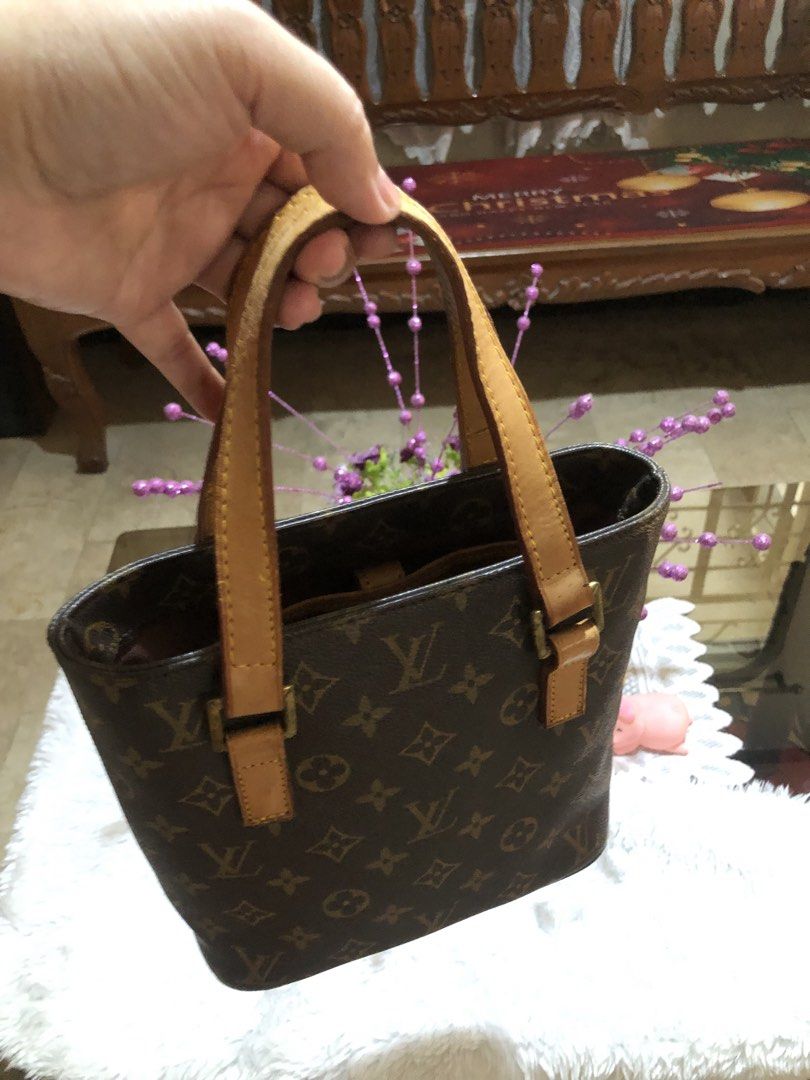 Louis Vuitton Vavin Monogram Canvas Bucket PM Bag (Category: Luxury Bags & Wallets) located in Meycauayan. Submitted by miletteaqu82717 (Listing ID 1440952209, Image 2). Description: - Louis Vuitton Monogram Canvas Bucket PM bag - Classic LV pattern - Genuine leather handles and trim - Interior features a zippered pocket and a slip pocket - Perfect for everyday use - Shows some signs of wear on handles and leather trim.