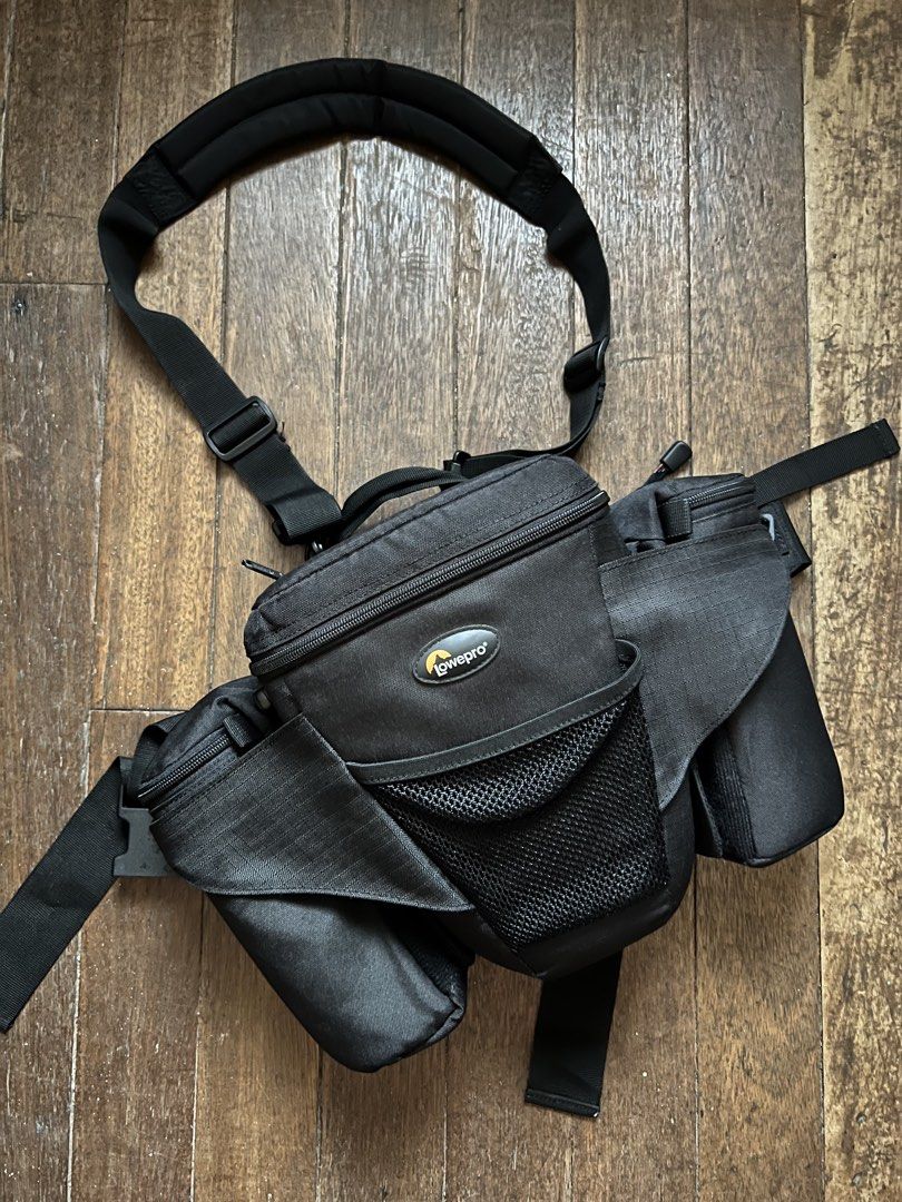 Lowepro and Nikon Camera Bags “bundle” (Category: Camera Bags & Carriers) located in Manila. Submitted by dansanjose09 (Listing ID 1441107556, Image 2). Description: For sale 3 Camera Bags Lowepro Off Trail 2 - good/used condition - 2 lens bag - with sling - ok zippers Lowepro Slingshot 200AW - good/used condition - with dividers - ok zippers Nikon Camouflage - good/used condition - slightly padded - ok zippers Price: 5500 fixed Free shipping Man