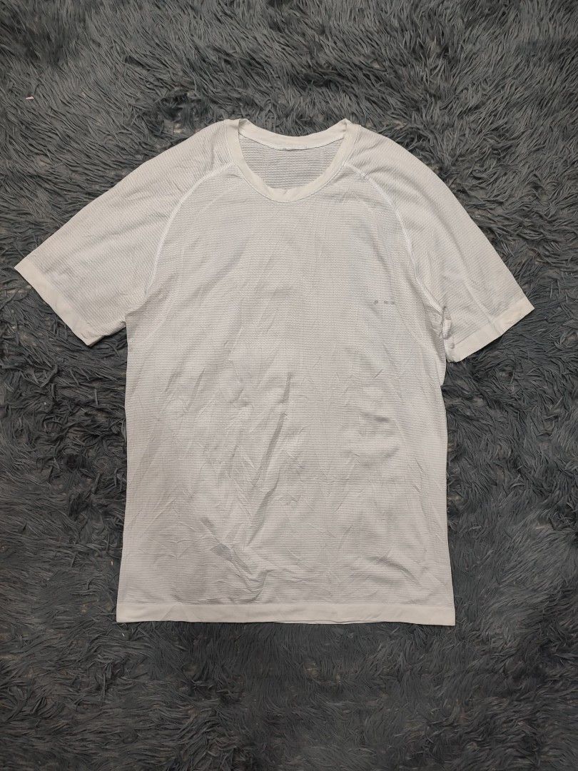 Lululemon Metal Vent Tech T-Shirt (Category: Activewear) located in Baguio. Submitted by barepicksph (Listing ID 1441042684, Image 1). Description: - Short sleeves, crew neck - Breathable fabric with subtle stripe pattern - Lululemon logo on sleeve - Ideal for workouts or casual wear -Issue: stain(check photos).