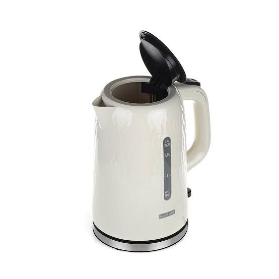 MAXIMUS MAX-K171C Electric Kettle White (Category: Kettles & Airpots) located in Manila. Submitted by biaman (Listing ID 1441132439, Image 2). Description: - Cream-colored electric kettle - Unique textured honeycomb design - Large 1.7L capacity - Simple one-touch on/off switch - Includes original packaging - Ideal for fast preparation of hot beverages.