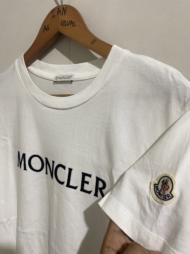 Moncler White T-Shirt with Logo (Category: Tshirts & Polo Shirts ) located in Dagupan City. Submitted by thriftmeupp____ (Listing ID 1440962959, Image 2). Description: moncler embossed 20 x 27 good as new orig no flaws.