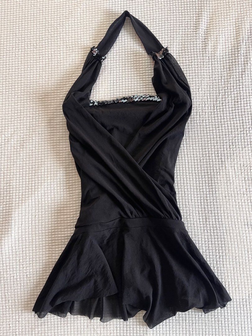 Morgan de Toi Black Halter Sequin Dress (Category: Dresses) located in Iloilo. Submitted by vintagemuseph (Listing ID 1441007085, Image 1). Description: - Brand: Morgan de Toi - Style: Black Halter Dress - Features: Sequined neckline and strap details - Skirt: Flowy, sheer overlay - Occasion: Ideal for parties or a night out - Condition: Please check photos for details.