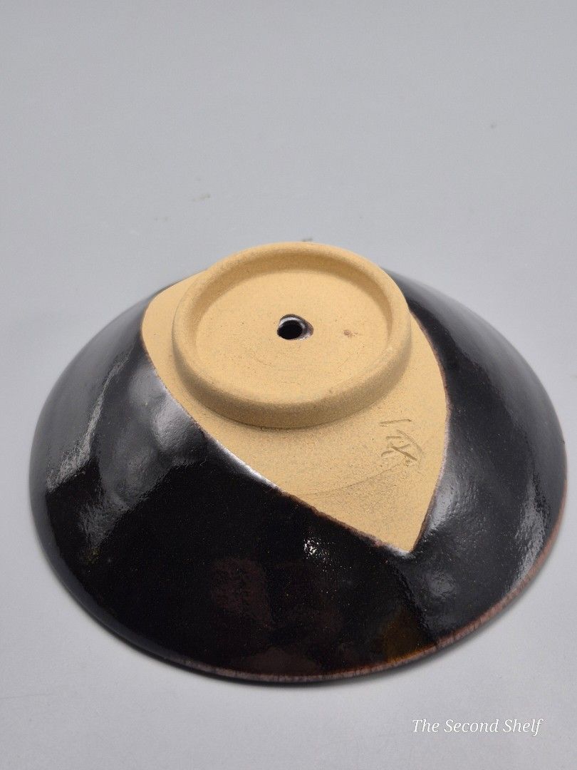 Murakami Suigun Sake Cup (Category: Coffee & Tea Tableware) located in Santa Rosa. Submitted by thesecondshelf (Listing ID 1441015068, Image 3). Description: Murakami Suigun Sake Cup Japanese Pottery with Center Hole Design A unique sake cup inspired by the legendary Murakami Naval Clan of Japan. Features a traditional center-hole design used for quick-drinking sake games and gatherings. • Japanese ceramic pottery • Traditional Murakami Suigun mo