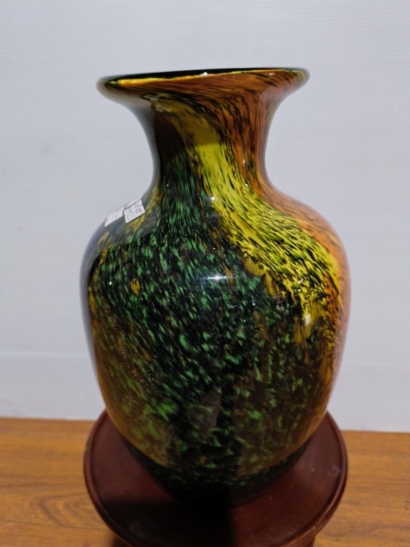 Murano Kamei Glass Vase (Category: Vases & Decorative Bowls) located in Muntinlupa City. Submitted by mcjek1026 (Listing ID 1441039890, Image 3). Description: - Vintage (25 yrs old) Beautiful hand-blown glass vase - Vibrant swirls of orange, yellow, green, and blue - Unique speckled pattern - Dimensions: 11" height x 6.5" width - Makes a great statement piece and adds a pop of color to any room - heavy & sturdy.