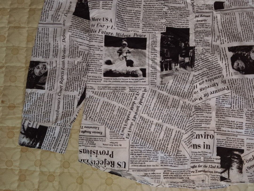 Newspaper Print Long Sleeve Button Up Shirt (Category: Coats, Jackets and Outerwear) located in Zamboanga. Submitted by nurbya898048 (Listing ID 1440979885, Image 3). Description: - Unique long sleeve button-up shirt - All-over newspaper print design - Makes a bold fashion statement - Versatile: pairs well with jeans or shorts - Stand out from the crowd with this eye-catching piece - Excellent condition - Color rate 10/10 - Size fit to large - Di