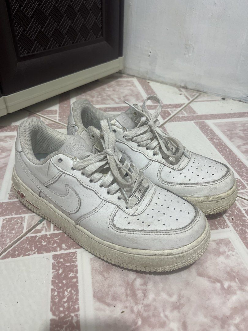 Nike Air Force 1 White Sneakers (Category: Sneakers) located in Pagsanjan. Submitted by vernetiboopski (Listing ID 1441041642, Image 1). Description: - Classic white Nike Air Force 1s - Essential for any sneaker collection - Pre-loved with visible signs of wear on soles and toe box - Plenty of life left for casual wear - Size 37.