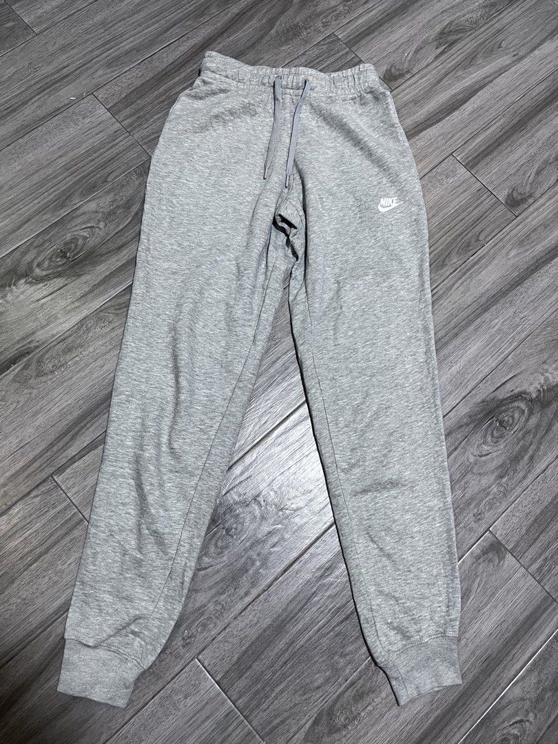 Nike Grey Sweatpants Joggers XS (Category: Joggers) located in Manila. Submitted by calmocean-f675cc (Listing ID 1441042782, Image 1). Description: - Grey Nike Sweatpants - Size: XS - Made in Pakistan - Elastic waistband with drawstring - Ribbed cuffs - Ideal for lounging or workouts - Measurements available in photos - Feel free to ask questions!.