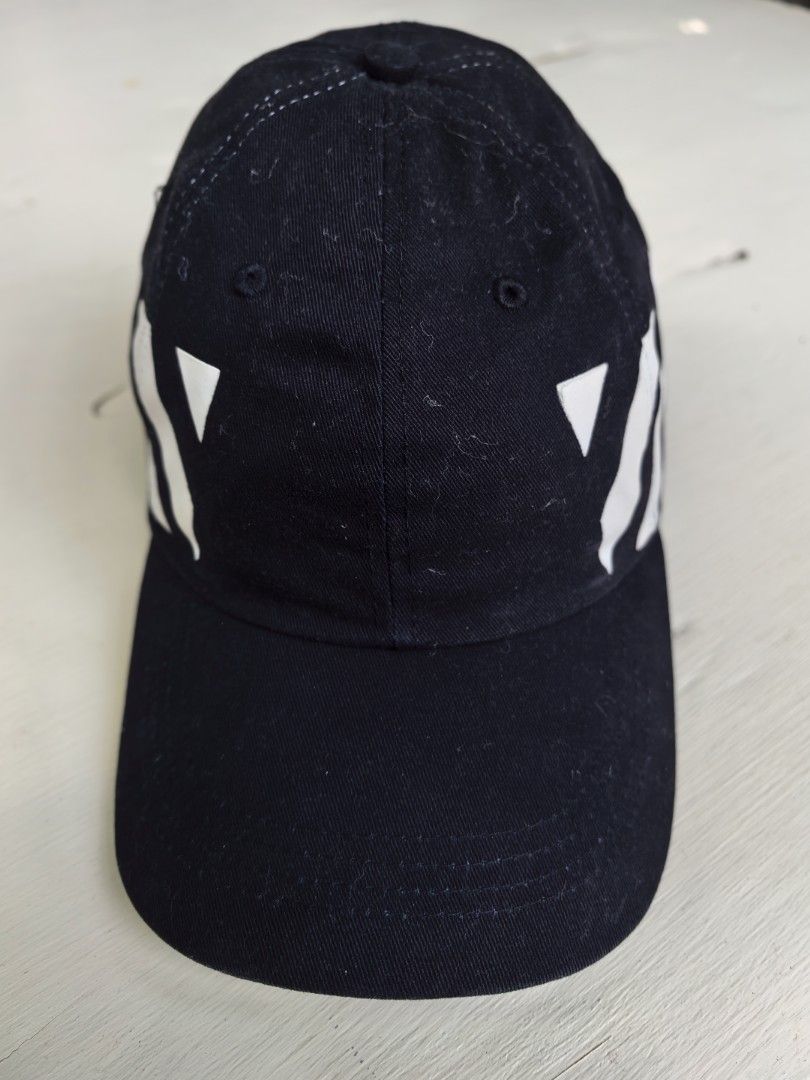 Off-White Baseball Cap (Category: Caps & Hats) located in Bacolod City. Submitted by bag_o.bukad (Listing ID 1440986955, Image 2). Description: - Authentic Off-White cap - Color: Black - Signature white diagonal stripes - Classic baseball cap design - Adjustable strap at the back for a custom fit - Ideal for everyday styling - Iconic streetwear piece Off/Fake 680 + sf.