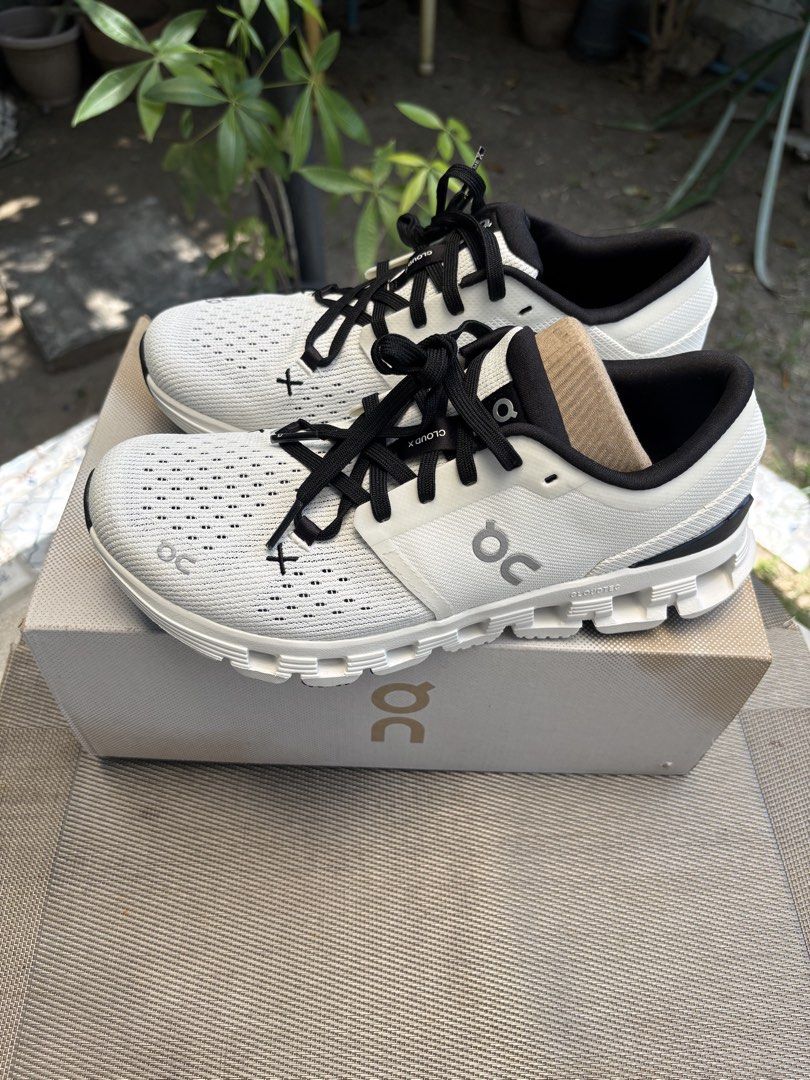 On Cloud X 4 Running Shoes White Black (Category: Sneakers) located in Las Pinas. Submitted by beaescobal (Listing ID 1440968912, Image 2). Description: - On Cloud X Running Shoes (White/Black) - Lightweight and breathable mesh upper - Responsive cushioning for optimal performance - Versatile: Great for training or everyday wear - Comes with original box Cloud X4 White/Black Size W8 Regular Price: 8690PHP Sale Price: 7386.5PHP.