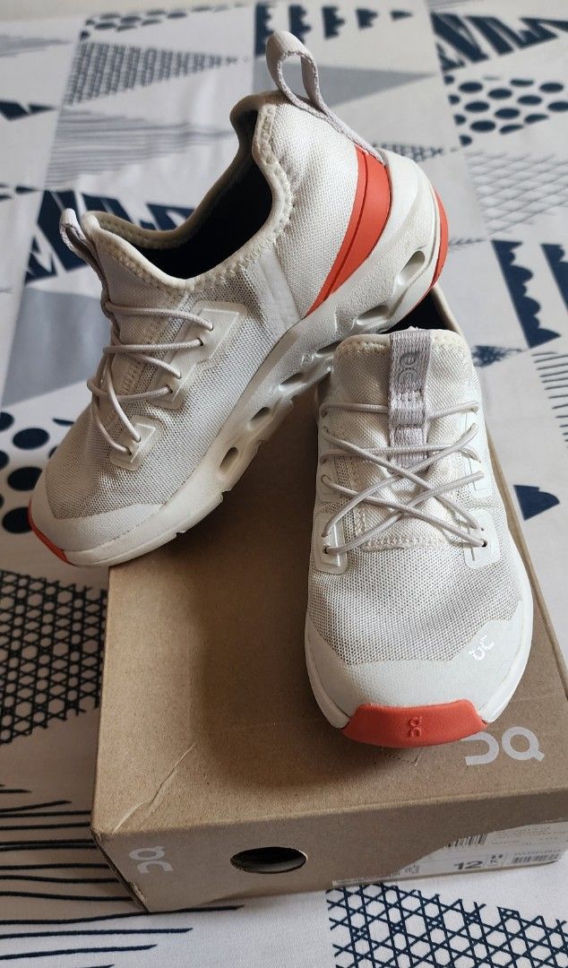 ON Cloudleap Running Shoes White Orange Size 12 (Category: Babies & Kids Fashion) located in Imus. Submitted by sashafame (Listing ID 1440963586, Image 2). Description: - ON Cloudleap running shoes - Color: White with orange accents - Size: 12 - Includes original box - Ideal for running and everyday wear - Lightweight and comfortable design almost new.