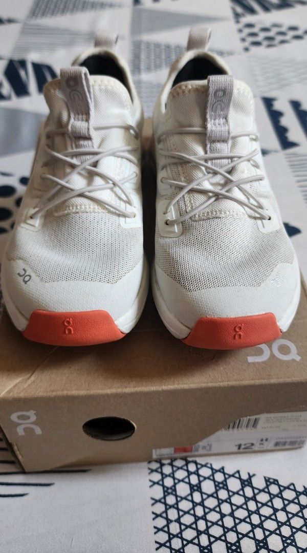 ON Cloudleap Running Shoes White Orange Size 12 (Category: Babies & Kids Fashion) located in Imus. Submitted by sashafame (Listing ID 1440963586, Image 3). Description: - ON Cloudleap running shoes - Color: White with orange accents - Size: 12 - Includes original box - Ideal for running and everyday wear - Lightweight and comfortable design almost new.