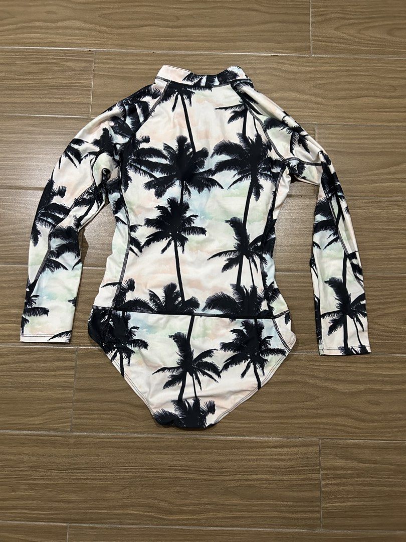 One-Piece Long sleeve Swimsuit (Category: Bikinis & Swimsuits) located in San Juan City. Submitted by curatedbymae (Listing ID 1441075914, Image 2). Description: Item: One-Piece Longsleeve Swimsuit - used twice only Size: S RFS: decluttering Mode of payment: GCASH/MAYA Shipping: J&T/Lalamove/Grab (Buyer will shoulder the shipping fee.).