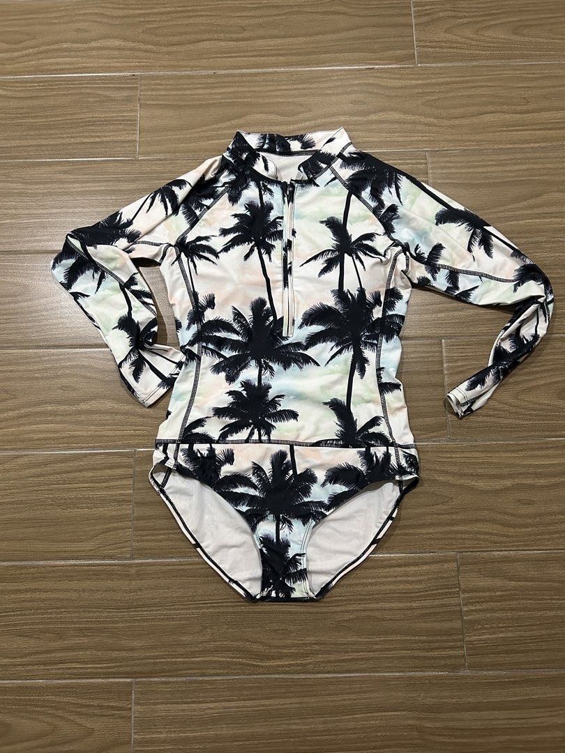 One-Piece Long sleeve Swimsuit (Category: Bikinis & Swimsuits) located in San Juan City. Submitted by curatedbymae (Listing ID 1441075914, Image 1). Description: Item: One-Piece Longsleeve Swimsuit - used twice only Size: S RFS: decluttering Mode of payment: GCASH/MAYA Shipping: J&T/Lalamove/Grab (Buyer will shoulder the shipping fee.).