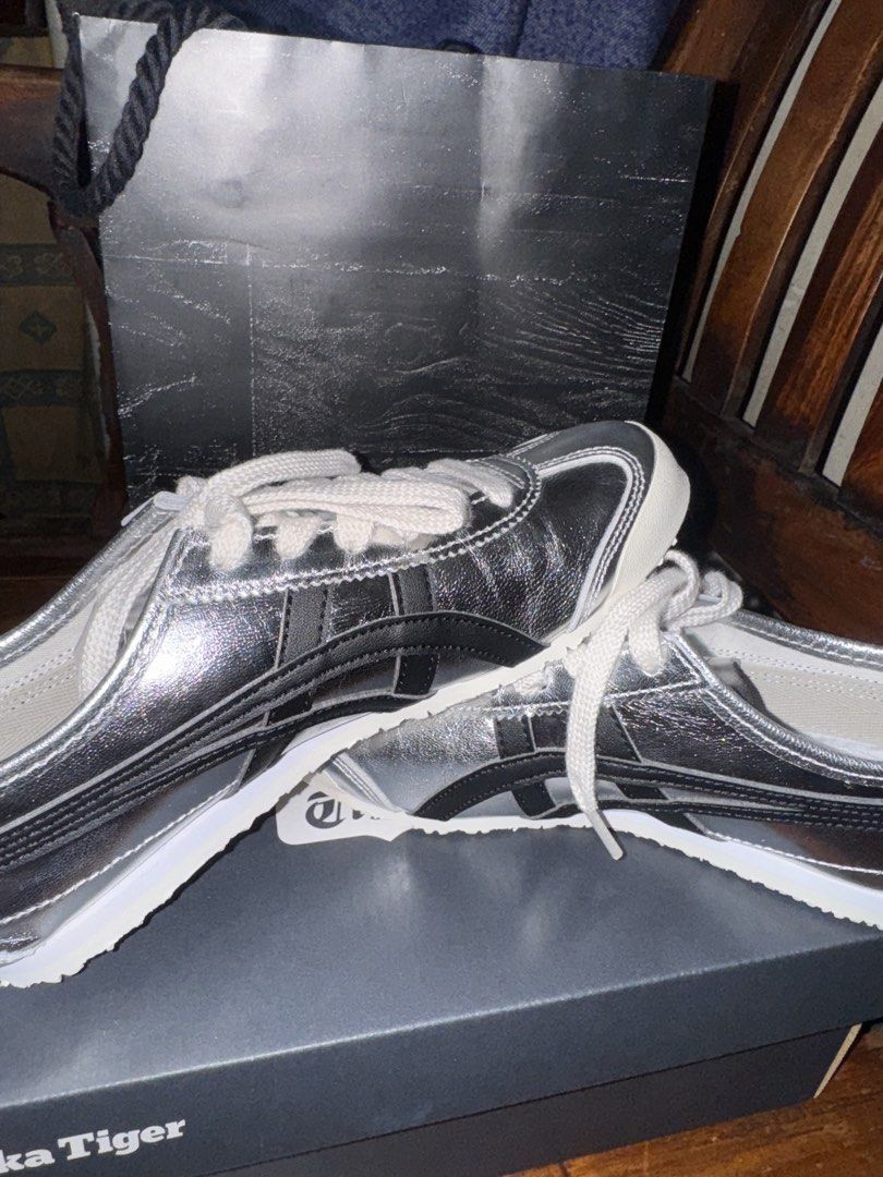 Onitsuka Tiger Mexico 66 Silver Metallic Sneakers (Category: Sneakers) located in Manila. Submitted by petalcorinjessa1 (Listing ID 1440955868, Image 1). Description: - Onitsuka Tiger Mexico 66 - Cool silver metallic color - Size: 4 UK / 36 EU / 22.5 CM - Comes with original box - Includes dust bag - Ideal for casual wear - Never used - Bought in Japan - Original srp is 9.9k Rfs: sister bought the wrong size .
