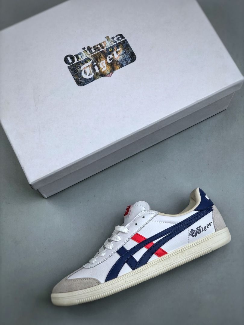 Onitsuka Tiger Tokuten White Navy Red Leather Sneakers EU35-EU45 (Category: Sneakers) located in Singapore. Submitted by umistore (Listing ID 1441150294, Image 3). Description: - Classic Onitsuka Tiger sneakers - White leather with navy and red accents - Suede toe cap - Includes original box - Versatile for casual or sporty looks - Timeless design.
