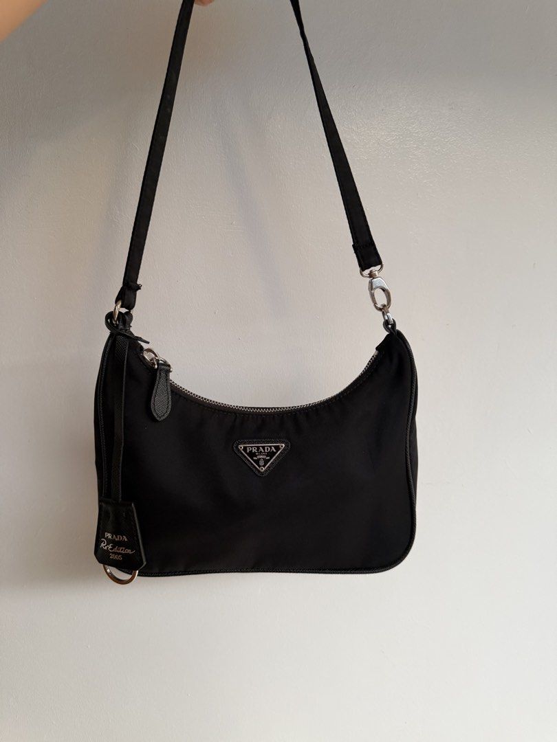 Orig Prada (Category: Luxury Bags & Wallets) located in Carranglan. Submitted by manella07 (Listing ID 1441103454, Image 1). Description: Original prada kilo bag pnly issue is replacement sling ..in very good condition.