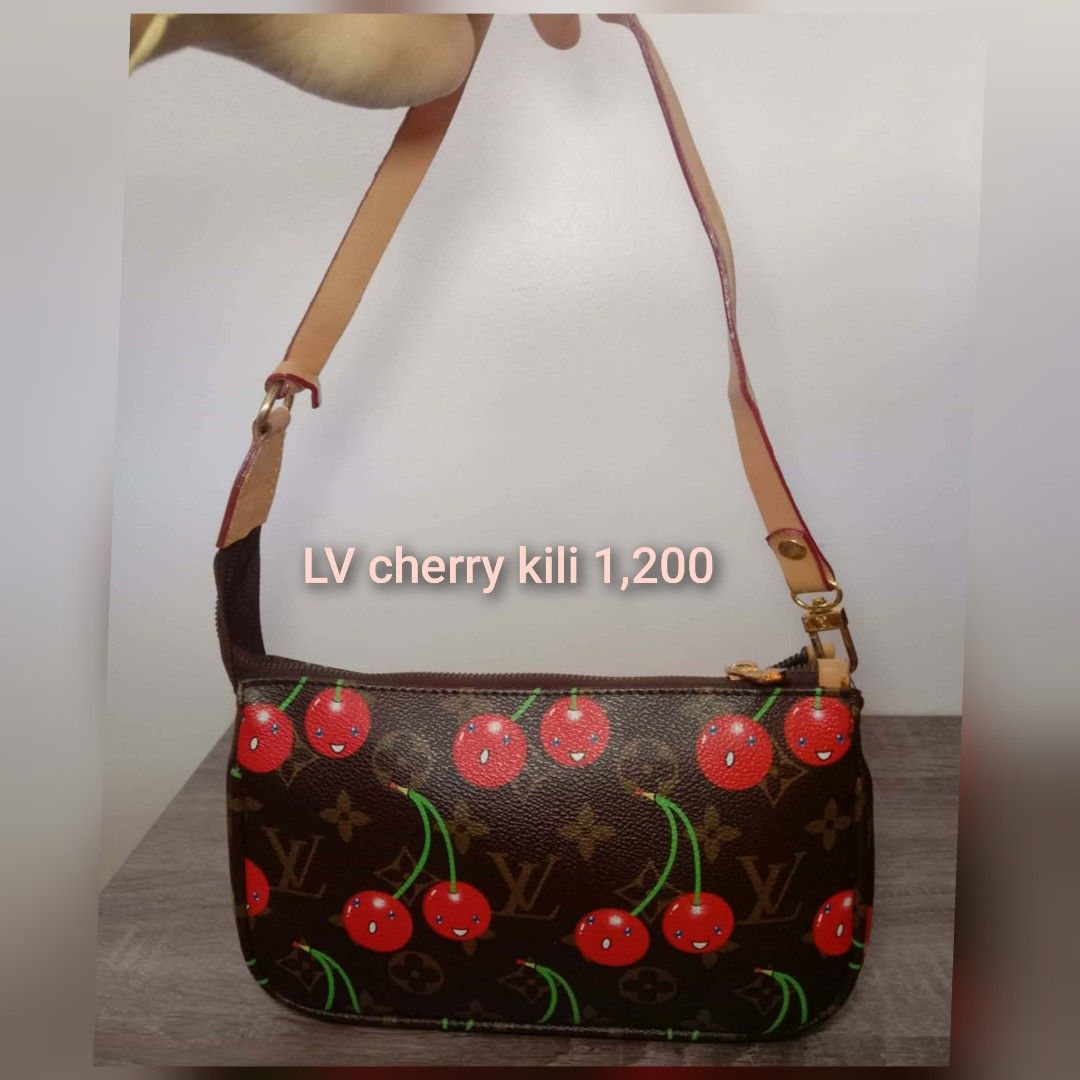 Original MK Hamilton Ostrich Medium Size Bag (Category: Luxury Bags & Wallets) located in Cebu City. Submitted by liezhoard (Listing ID 1441106511, Image 3). Description: Original Michael Kors Hamilton bag. Ostrich texture in a bright pink. Medium size. Comes with a long strap and gold chain details. Lock closure. Great for everyday use or a night out..
