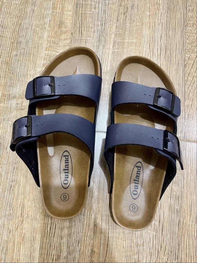 Outland Navy Blue Double Strap Cork Sandals Size 9 (Category: Slippers & Slides) located in Baguio. Submitted by ej_fab (Listing ID 1441119372, Image 2). Description: - Brand: Outland - Color: Navy Blue - Size: 9 - Design: Double strap with adjustable buckles - Feature: Comfortable cork footbed - Occasion: Great for casual wear.