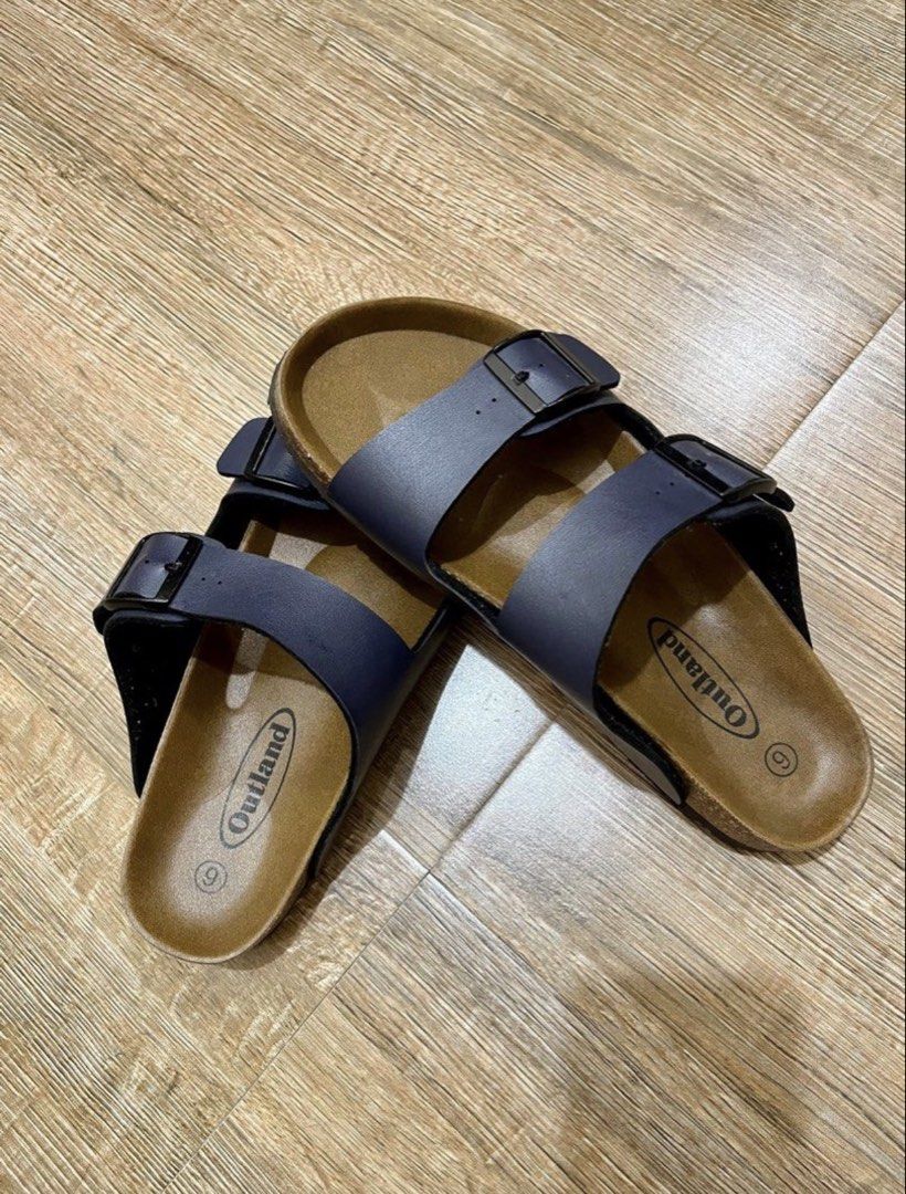 Outland Navy Blue Double Strap Cork Sandals Size 9 (Category: Slippers & Slides) located in Baguio. Submitted by ej_fab (Listing ID 1441119372, Image 3). Description: - Brand: Outland - Color: Navy Blue - Size: 9 - Design: Double strap with adjustable buckles - Feature: Comfortable cork footbed - Occasion: Great for casual wear.