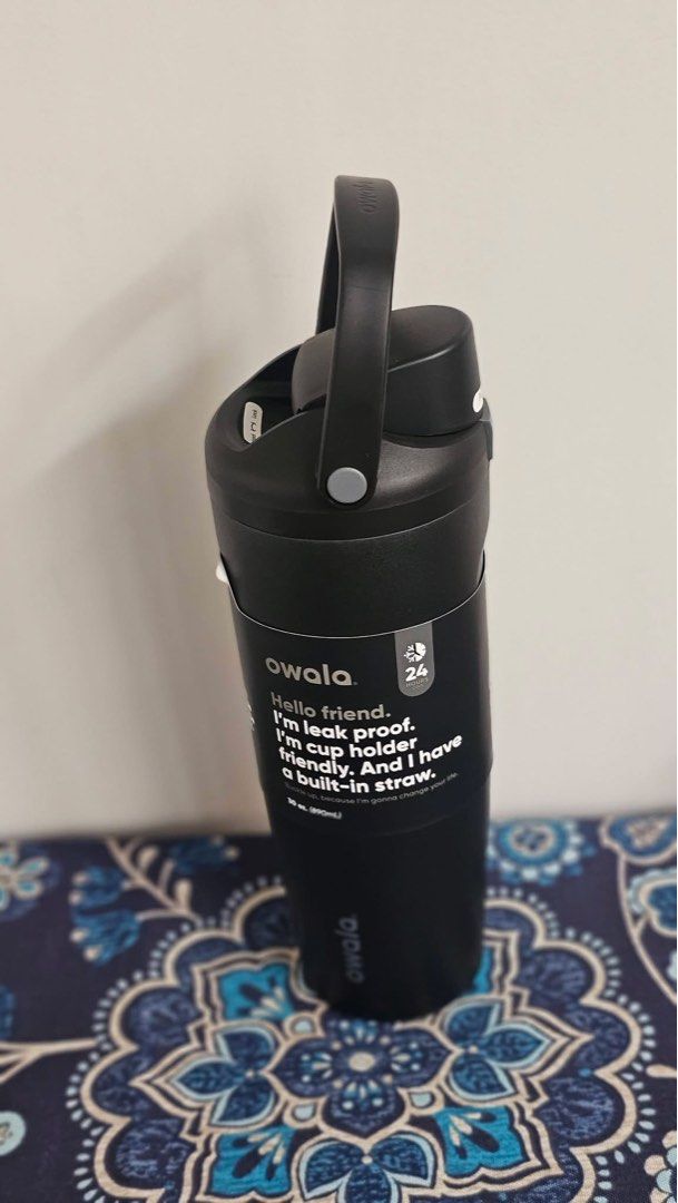 Owala Black 30 oz Tumbler with Built-in Straw and handle (Category: Water Bottles & Tumblers) located in Talisay. Submitted by secondsbyvan (Listing ID 1441035662, Image 2). Description: - Owala 30 oz (890mL) Tumbler - Leak-proof design - Cup holder friendly - Built-in straw for easy sipping - Convenient carrying handle - Keeps drinks cold for up to 24 hours - Easy-open spout with push button.