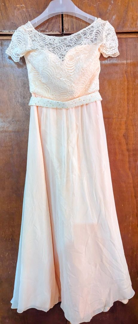 Peach Lace Off-Shoulder Formal Gown (Category: Evening dresses & gowns) located in Caloocan City. Submitted by zayzay_18 (Listing ID 1440986342, Image 1). Description: - Beautiful peach formal gown - Delicate lace bodice with short sleeves - Beaded band accent at the waist - Flowing chiffon skirt - Perfect for weddings, parties, and special occasions - Comfortable and chic design.