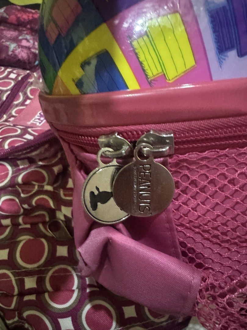 Peanuts Snoopy & Woodstock Backpack (Category: Backpacks) located in Manila. Submitted by kreeespy (Listing ID 1441068887, Image 3). Description: - Adorable pink hardcase backpack featuring a vibrant Snoopy and Woodstock graphic. - Includes a spacious main compartment for essentials. - Convenient front pocket compartment with zipper pull for quick access. - Adjustable straps ensure a comfortable fit for all. - Versatile for school, travel, or eve