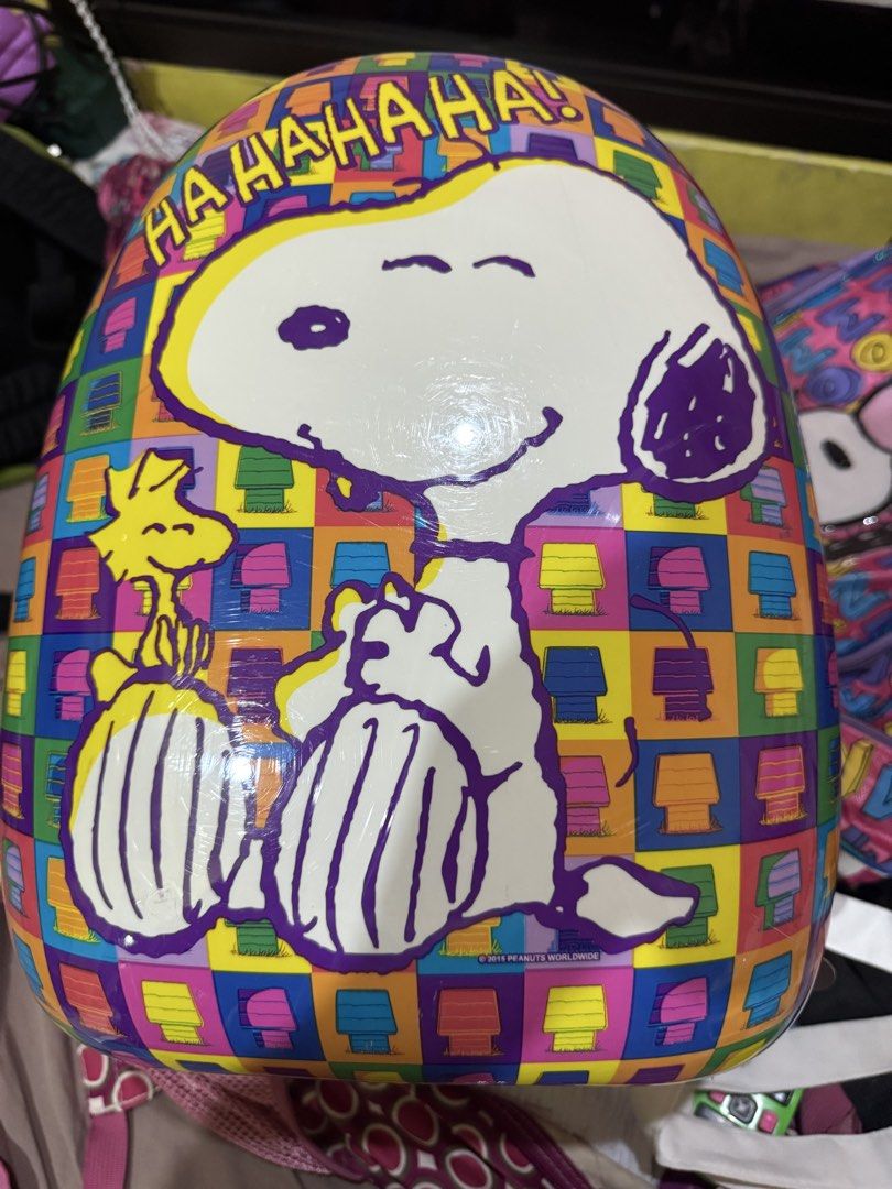 Peanuts Snoopy & Woodstock Backpack (Category: Backpacks) located in Manila. Submitted by kreeespy (Listing ID 1441068887, Image 1). Description: - Adorable pink hardcase backpack featuring a vibrant Snoopy and Woodstock graphic. - Includes a spacious main compartment for essentials. - Convenient front pocket compartment with zipper pull for quick access. - Adjustable straps ensure a comfortable fit for all. - Versatile for school, travel, or eve