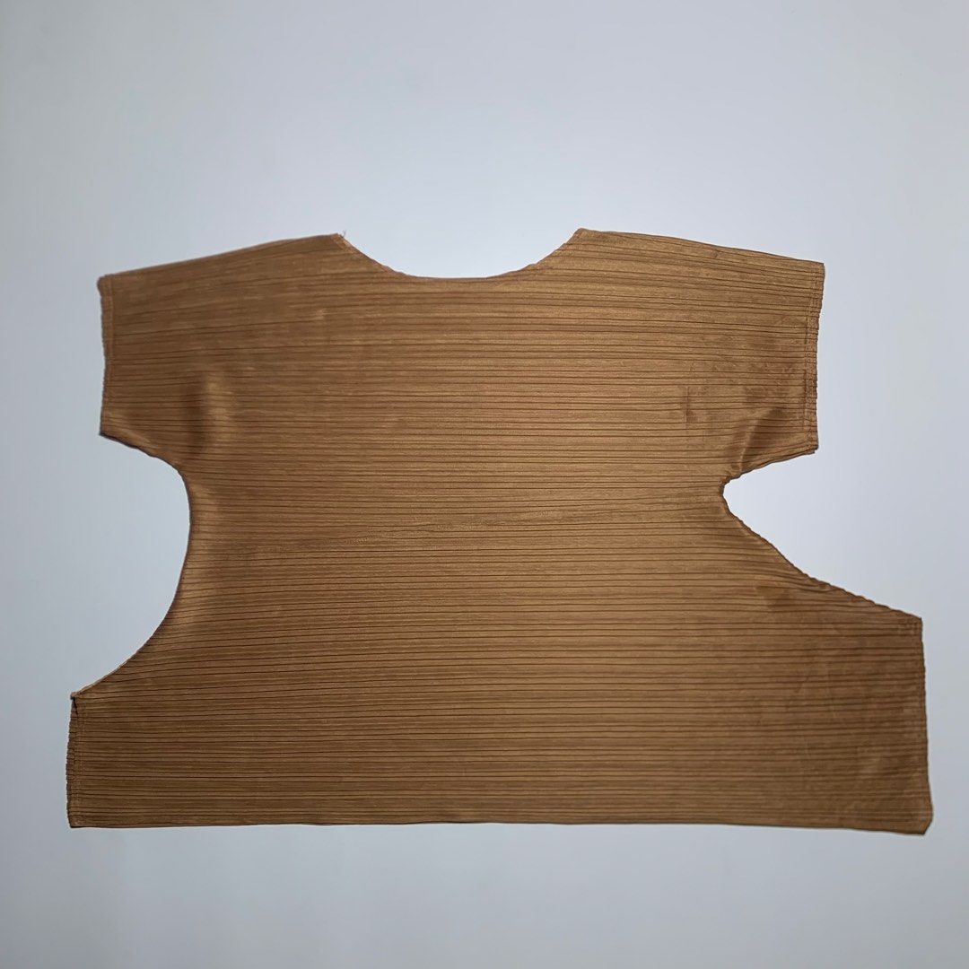 Pleats Please Issey Miyake - short sleeve (Category: Others Tops) located in Manila. Submitted by shottas_21 (Listing ID 1441097885, Image 1). Description: Pleats Please Issey Miyake - short sleeve SIZE - CONDITION - 9/10 CHEST - 23” LENGTH - 23”.