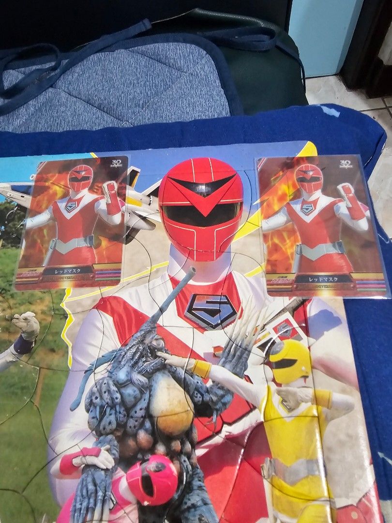 Power Rangers Puzzle with Character Cards (Category: Board Games & Puzzles) located in Muntinlupa City. Submitted by jojiepogi123 (Listing ID 1441129134, Image 1). Description: Power Rangers puzzle featuring multiple rangers and monsters. Includes character cards. Great for any Power Rangers fan. Fun activity for kids or collectors. Made in Japan. 2 cards red mask.