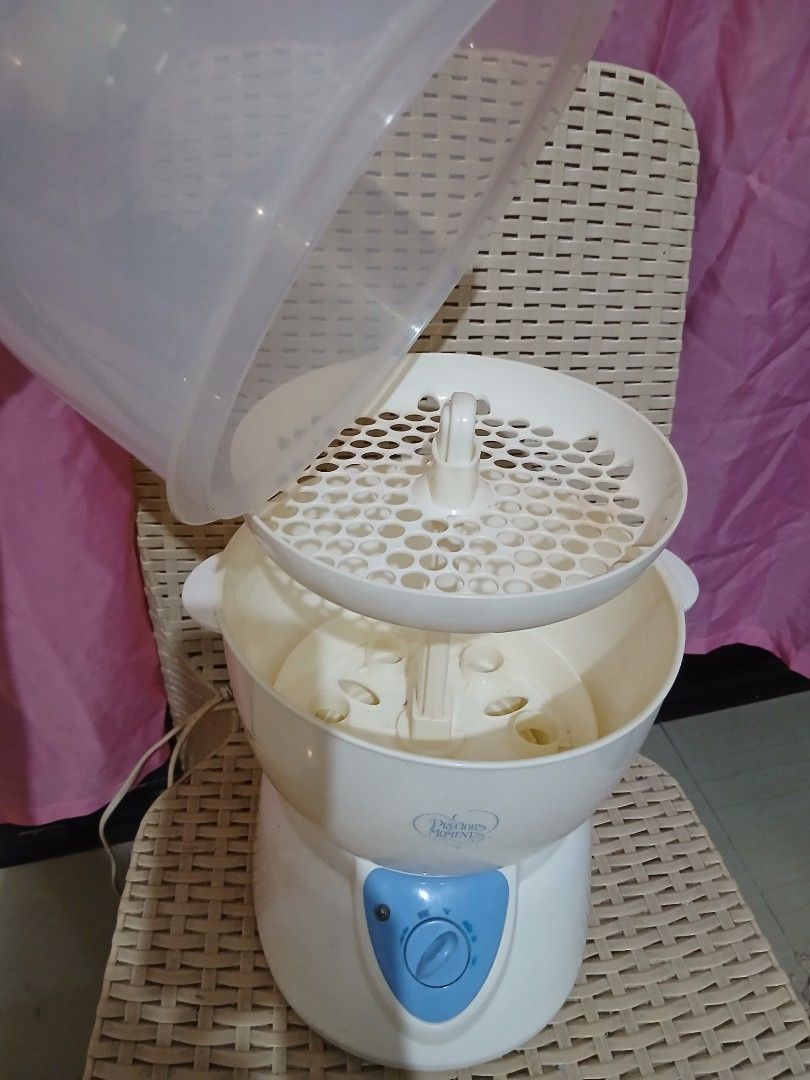 Precious Moments Bottle Sterilizer with Accessories (Category: Breastfeeding & Bottle Feeding) located in Mandaluyong City. Submitted by bape_daying (Listing ID 1441085831, Image 2). Description: Issue: Very well fubctioning, wire need a bit of elect tape Location: Mandaluyong Mode of Payment: Gcash.