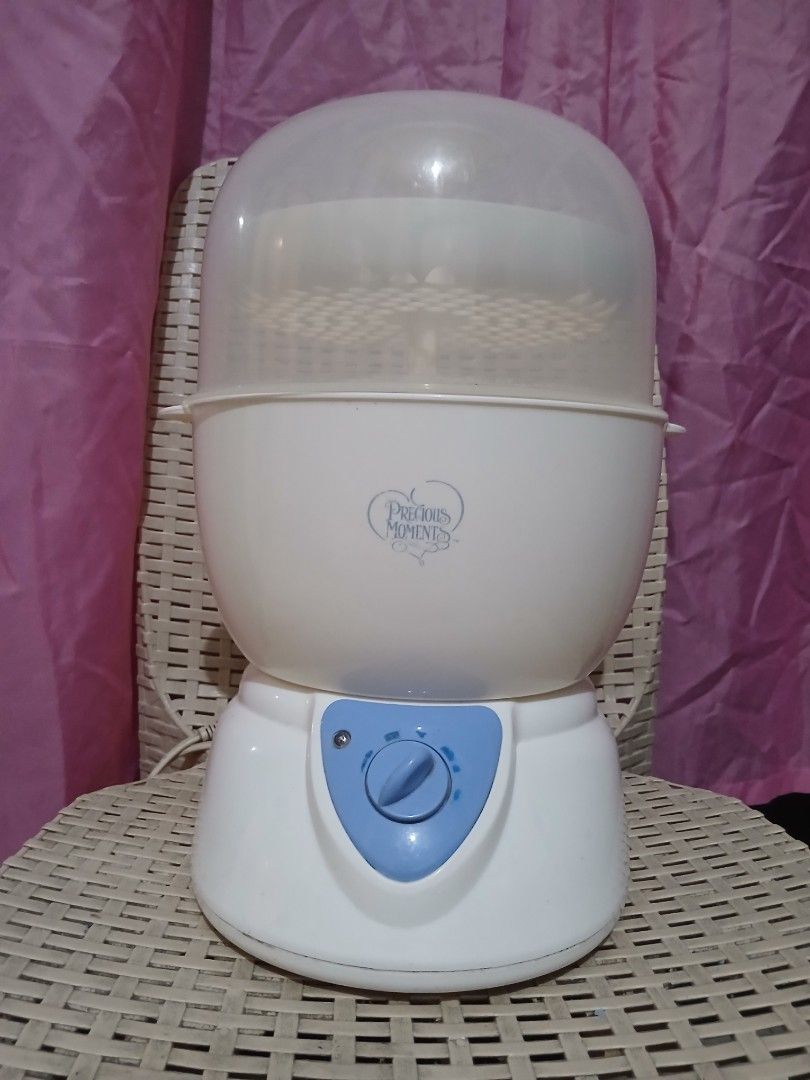 Precious Moments Bottle Sterilizer with Accessories (Category: Breastfeeding & Bottle Feeding) located in Mandaluyong City. Submitted by bape_daying (Listing ID 1441085831, Image 1). Description: Issue: Very well fubctioning, wire need a bit of elect tape Location: Mandaluyong Mode of Payment: Gcash.