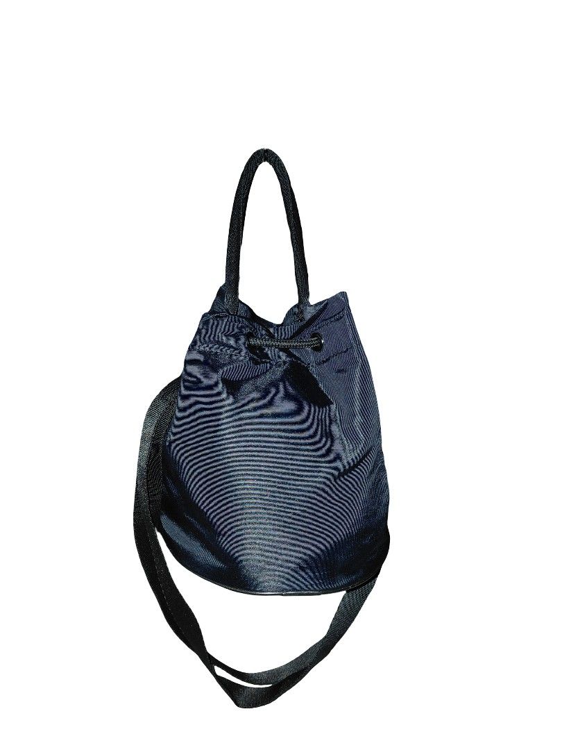 PUMA Core Pop Bucket Cross-Body Bag (Category: Cross-body Bags) located in Cabanatuan. Submitted by ggorae (Listing ID 1441065104, Image 2). Description: This is personally owned, so please manage your expectations. Color may vary due to lighting and flash. – 100% Original, bought from PUMA official orange store. – Condition: 8.5/10. The silicon logo started to break. Please check the photos to see the actual condition. – 17 cm x 17 cm x 20 cm, 2