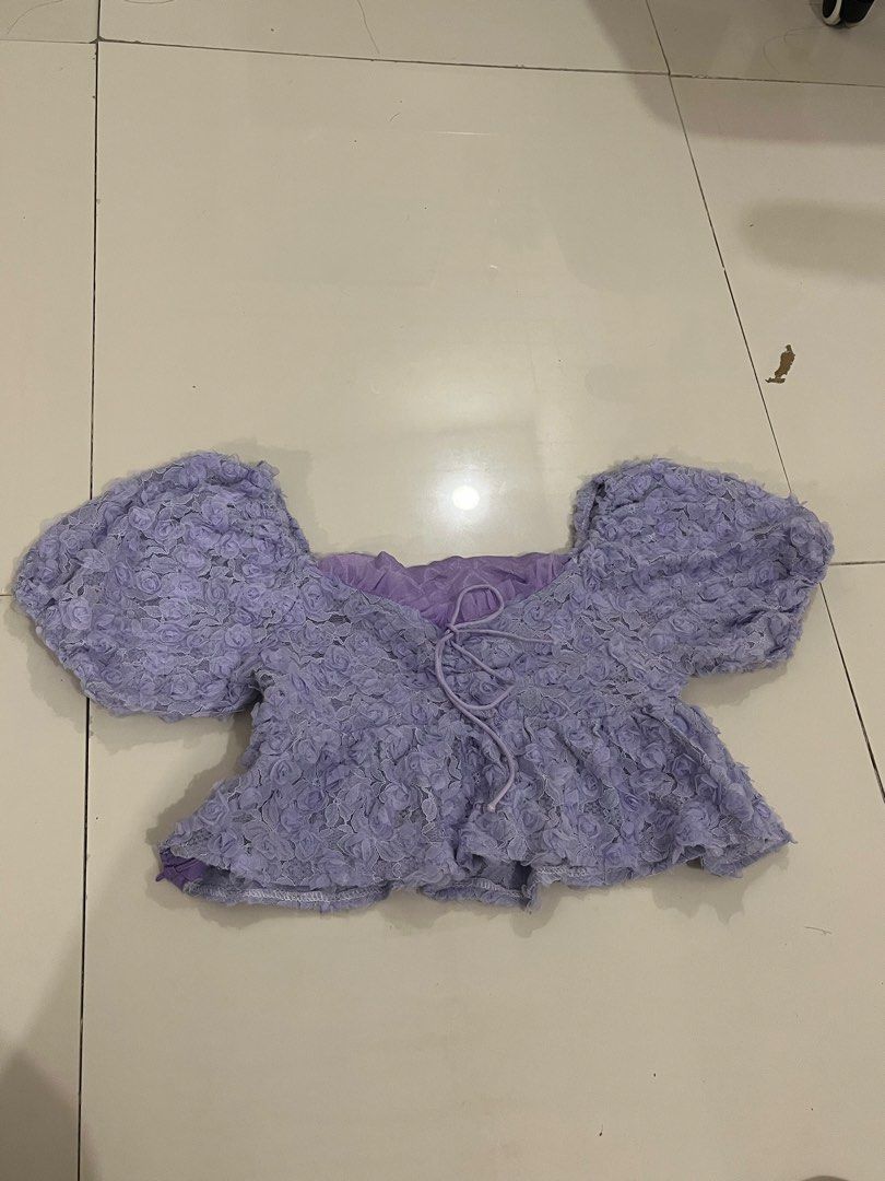 Purple Lace Puff Sleeve Crop Top (Category: Blouses) located in Trece Martires City. Submitted by rubyjwle (Listing ID 1441124285, Image 1). Description: - Features puff sleeves - Textured floral lace pattern - size: Meduim - small Mop: pf via gcash/maya Mod: jnt/lalamove loc: cavite Can do meet ups/pick up if malapit .