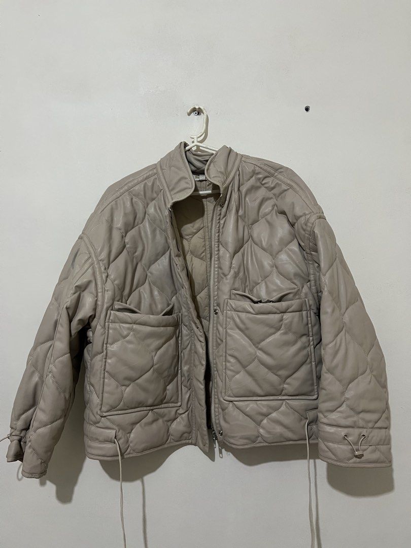Quilted Faux Leather Jacket (Category: Coats, Jackets and Outerwear) located in Manila. Submitted by msgldn (Listing ID 1441040499, Image 1). Description: - Lightweight quilted jacket - Faux leather appearance - Stand-up collar - Two front pockets - Drawstring hem - Button and zip closure - Ideal for layering.