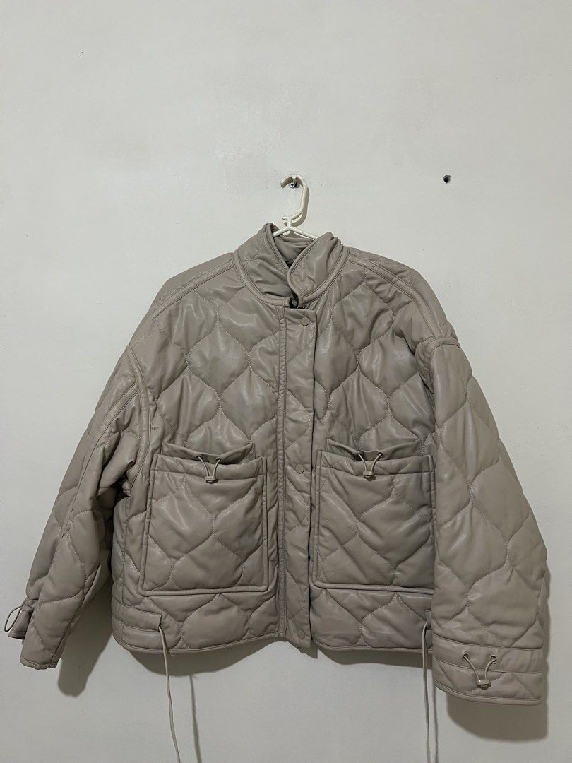 Quilted Faux Leather Jacket (Category: Coats, Jackets and Outerwear) located in Manila. Submitted by msgldn (Listing ID 1441040499, Image 2). Description: - Lightweight quilted jacket - Faux leather appearance - Stand-up collar - Two front pockets - Drawstring hem - Button and zip closure - Ideal for layering.
